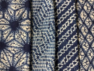 A piece of sashiko embroidery with intricate patterns.