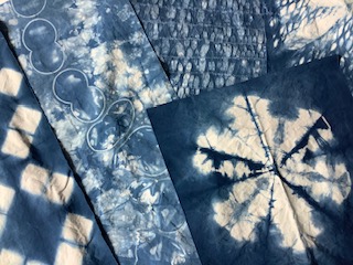 A piece of sashiko embroidery with intricate patterns.